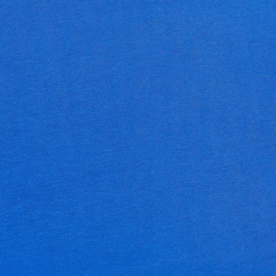 A folded length of smooth royal-blue jersey fabric.